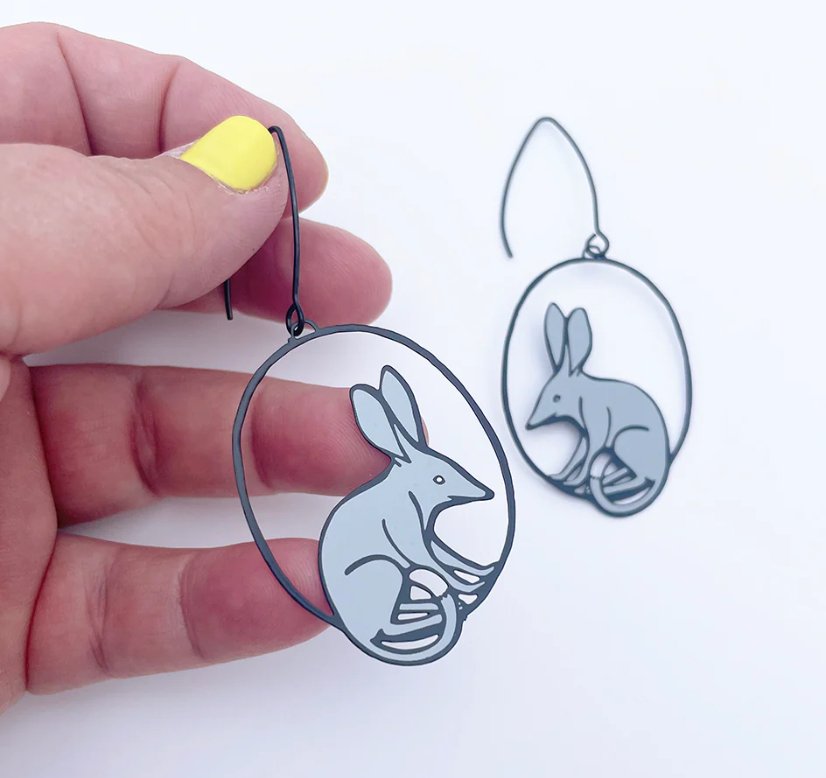 DENZ Midi Bilby Earrings in Black/Grey, held by hand