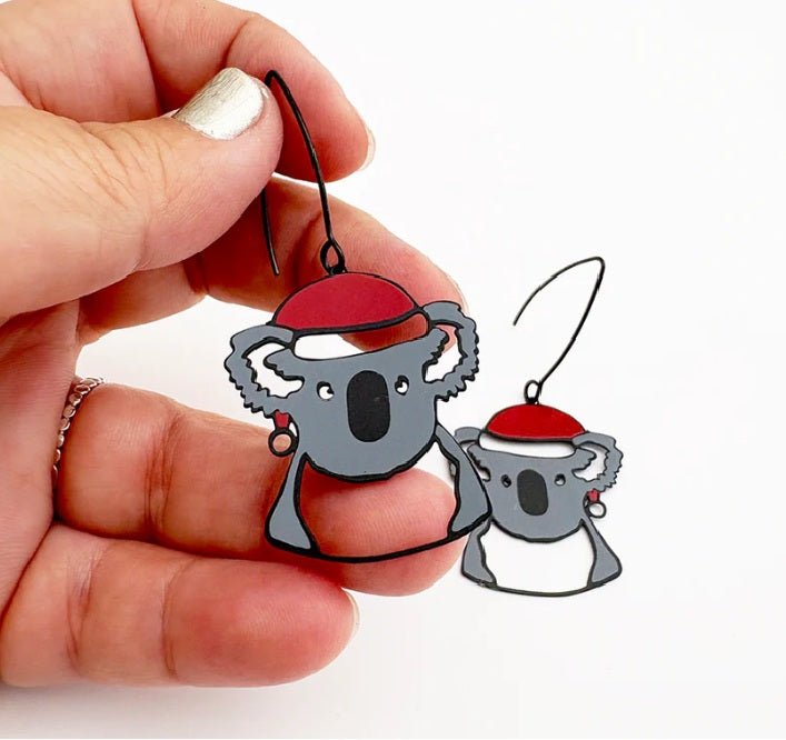 Denz Midi Christmas Koala Earrings in Black/Grey/Red, held by hand