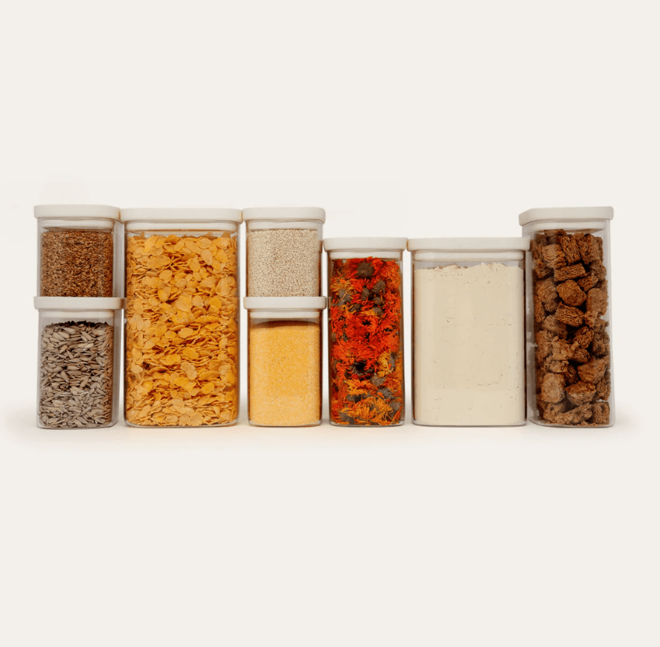 Seed & Sprout 8-piece oatmeal pantry bundle featuring clear stackable containers filled with various dry grains, cereals, and seeds.