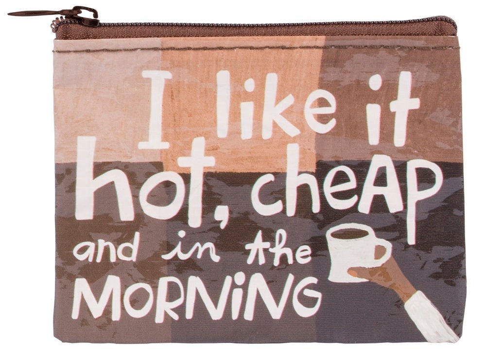 A small brown Blue Q zippered coin purse featuring white handwritten text reading "I like it hot, cheap and in the morning" next to a hand holding a coffee cup.