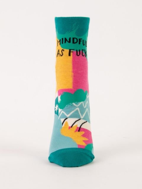 Front view of a single Blue Q women's ankle sock with colorful abstract color-blocking reading "MINDFUL AS FUCK".