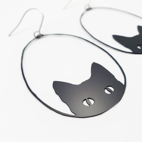 DENZ Black cats in black, angled view