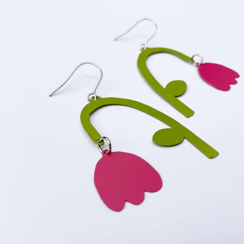 DENZ Drop Flowers in sage and hot pink, painted steel dangles, angled view