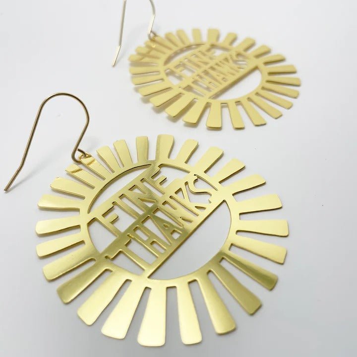 DENZ Fine thanks in gold earrings, angled view