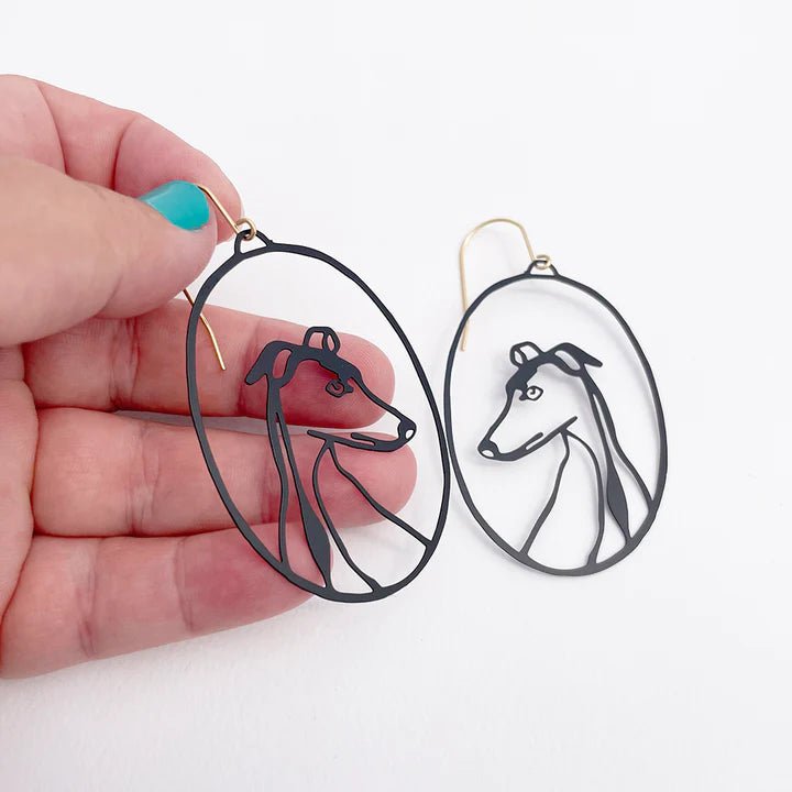 DENZ Greyhound/Whippet/Iggy in Black earrings, held by hand
