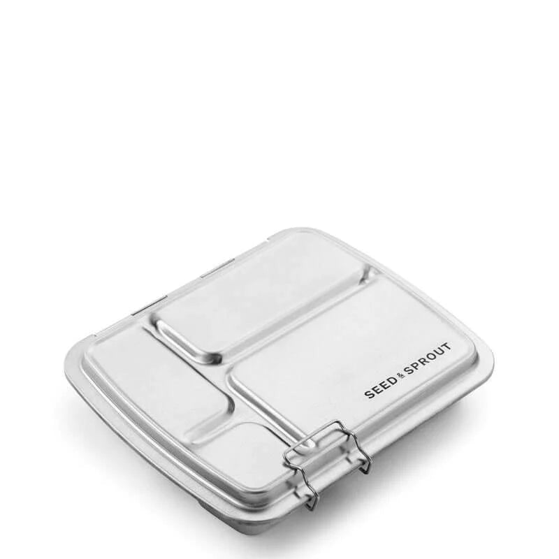 Seed & Sprout Large CrunchBox closed stainless steel bento lunch box featuring an engraved brand logo and secure front latch.