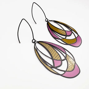 Pair of DENZ Art School Drop Out earrings on a white background