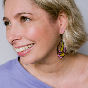 Image of a woman with short blonde hair wearing DENZ Art School Drop Out earrings in Warm