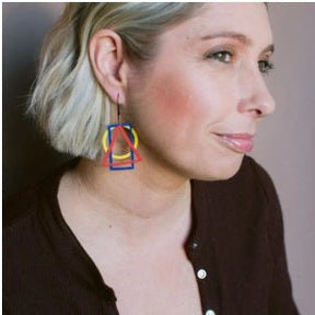 Side profile of a woman wearing Denz Basic Shape Earrings in Primarys 