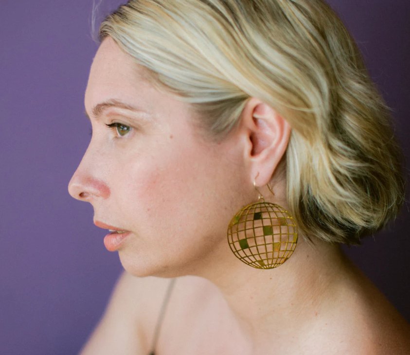 Woman wearing the DENZ Disco Balls in Gold 