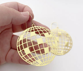 DENZ Disco Balls in Gold, held by hand