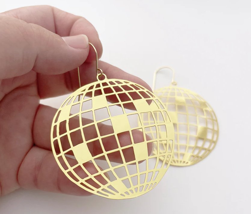 DENZ Disco Balls in Gold, held by hand