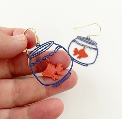 DENZ Goldfish in Orange/ Blue painted steel dangles, held by hand