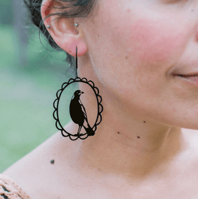 Side profile of a woman wearing the DENZ Magpie in Black 