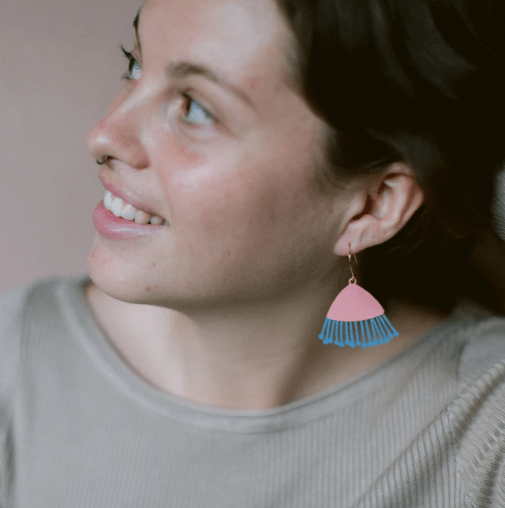 Side profile of a woman wearing the DENZ Midi Gum Blossoms in Coral and Sky