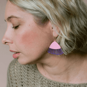Side profile of a woman wearing the DENZ Midi Gum Blossoms in Musk Pink and Eggplant