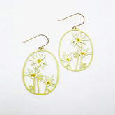 A pair of DENZ Flannel Flower earrings in Lemon & Cream featuring cutout floral designs, displayed on a clean white background.
