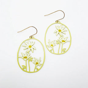 A pair of DENZ Flannel Flower earrings in Lemon & Cream featuring cutout floral designs, displayed on a clean white background.