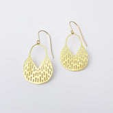 A pair of DENZ Callisia gold dangle earrings with a textured, openwork geometric pattern, shown on a plain light gray background.