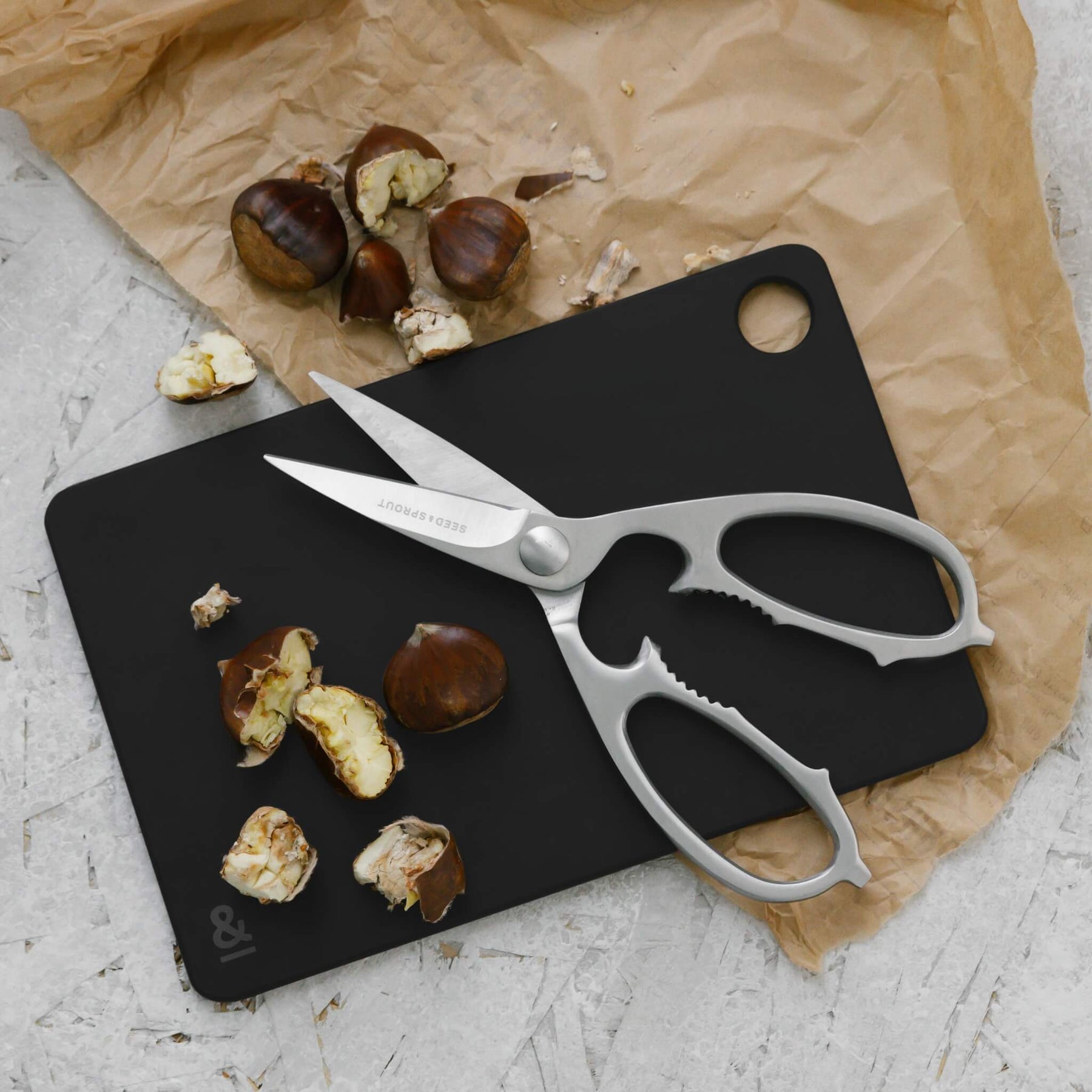 Seed & Sprout Mini Chopping Board and Kitchen Shears Flat Lay.