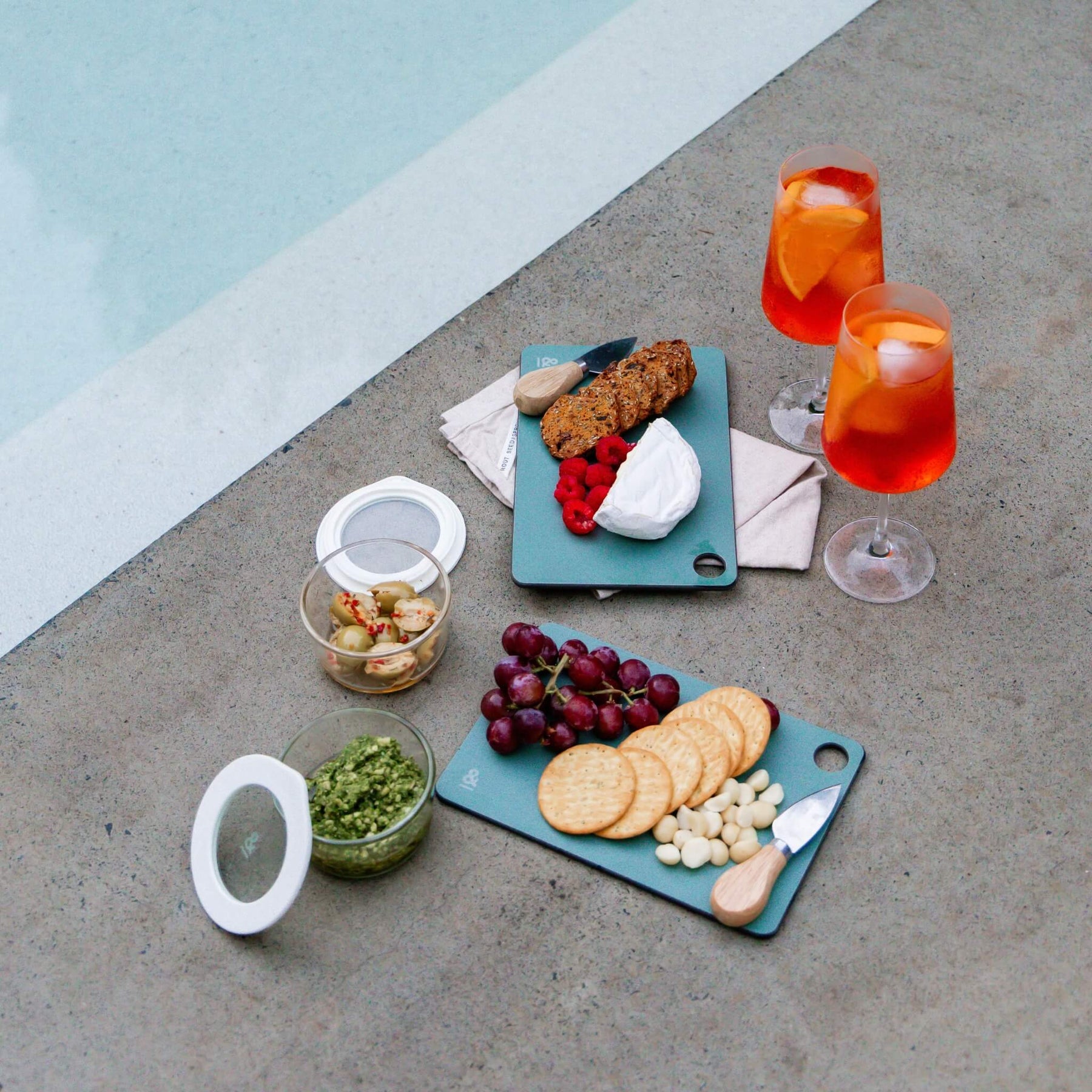Seed & Sprout Mini Chopping Boards and Glass Containers Poolside Picnic Setup.