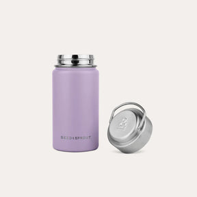 An open Seed and Sprout Durable 350ml Insulated Stainless Steel Drink Bottle in Plum standing upright next to its unscrewed silver cap.
