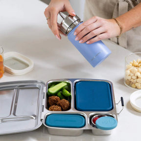 Seed & Sprout lilac 350ml insulated drink bottle and stainless steel bento lunch box meal prep setup.