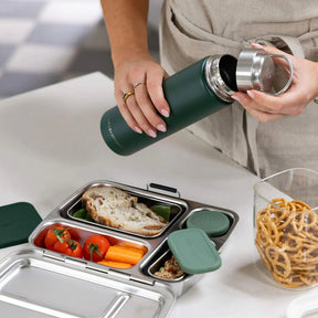 Seed & Sprout in moss drink bottle and stainless steel lunch box meal prep setup.