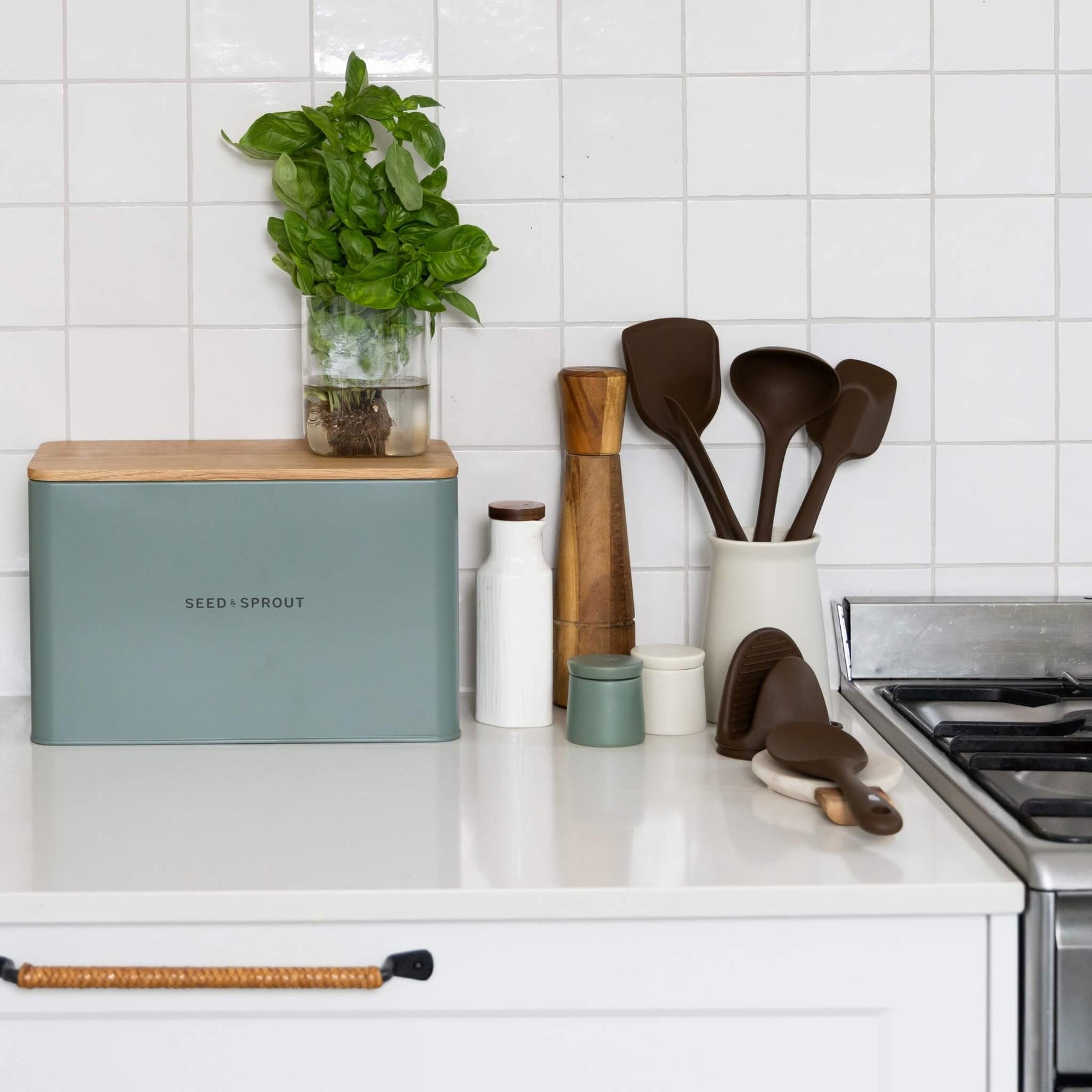 Seed & Sprout Sage Green Bread Box and Clove Silicone Kitchen Utensils Countertop Styling.
