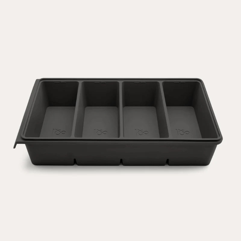 An open Seed & Sprout 4 Portion Silicone Freezer Tray showing four empty internal compartments.
