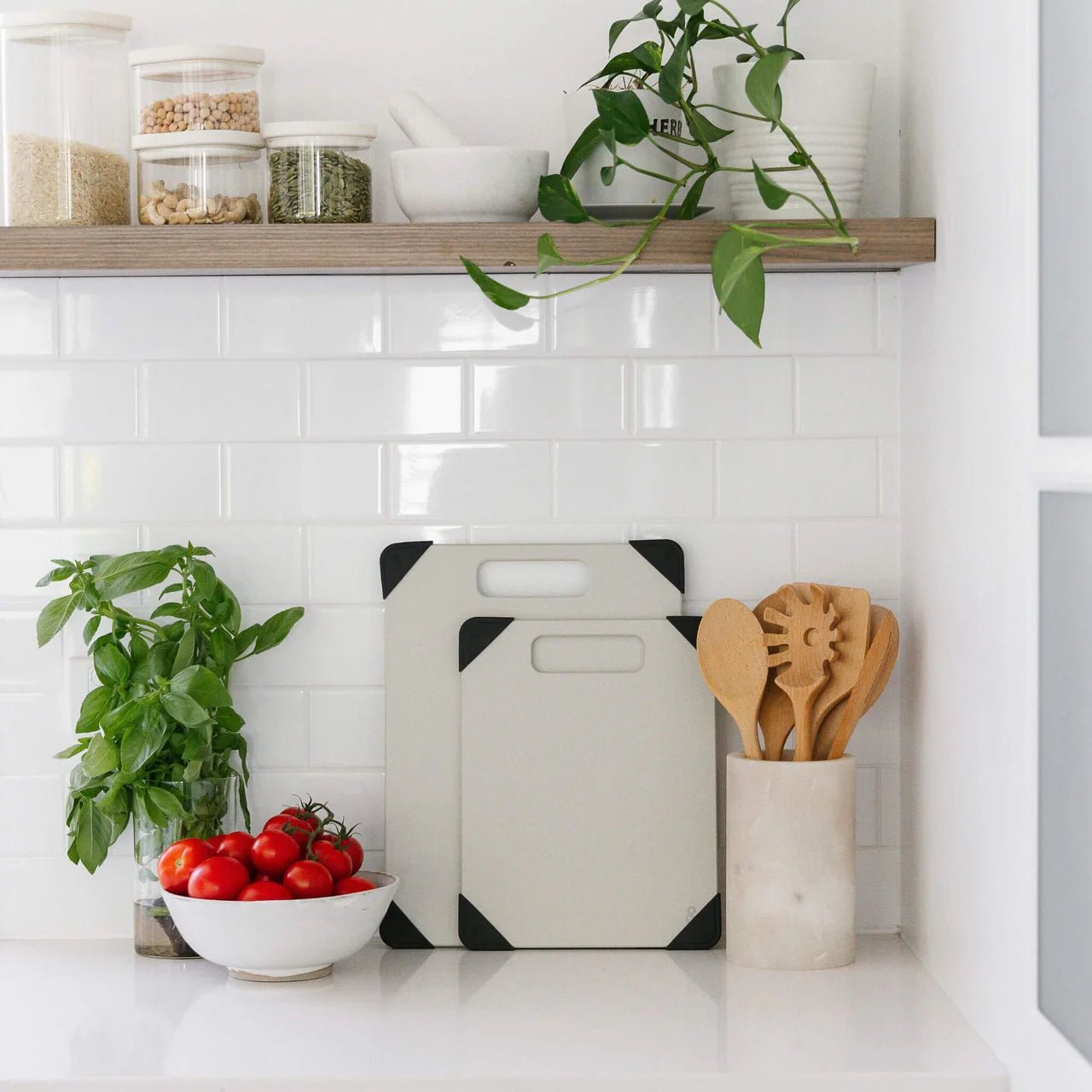 Seed & Sprout Anti-Slip Chopping Board set displayed in a modern white kitchen.