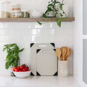 Seed & Sprout Anti-Slip Chopping Board set displayed in a modern white kitchen.