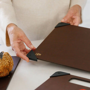 Seed & Sprout Anti-Slip Chopping Board Corners attached to a nutmeg cutting board.