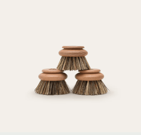Seed & Sprout wooden dish brush replacement heads stacked in a trio pyramid