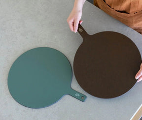 Seed & Sprout Limited Edition Round Wood Fibre Chopping Board in eucalyptus and nutmeg.