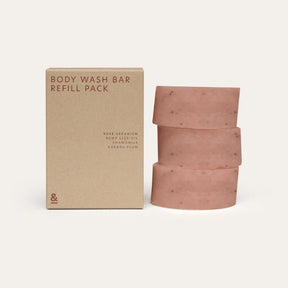 Seed & Sprout Rose Geranium natural body wash bar refill pack featuring a stack of three pink botanical soap bars next to their eco-friendly cardboard packaging.