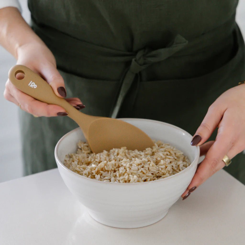Seed & Sprout Silicone Rice Spoon in Praline use in serving brown rice.