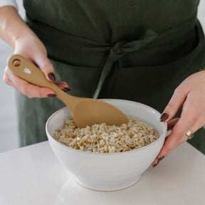 Seed & Sprout Silicone Rice Spoon in Praline use in serving brown rice.