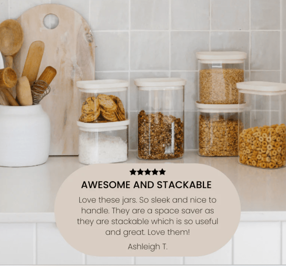 Seed & Sprout 8-piece pantry storage bundle in oatmeal with stackable clear jars and matching lids displayed on a white kitchen counter.