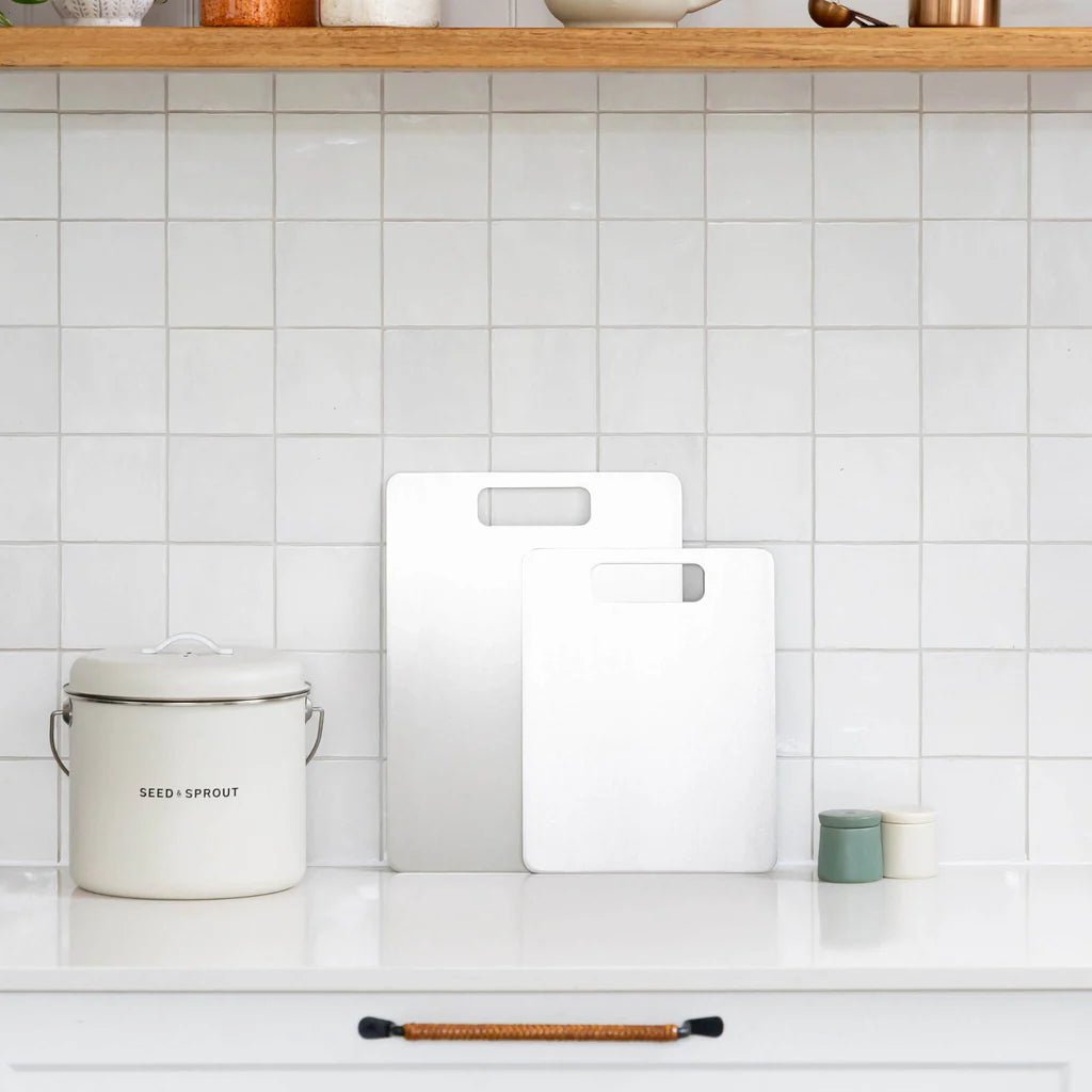 Seed & Sprout Titanium Cutting Boards and Kitchen Canister Display.