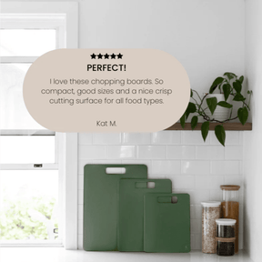 Seed & Sprout set of three Eucalyptus wood fibre chopping boards displayed in graduated sizes against a white tiled kitchen backsplash, featuring a superimposed 5-star customer review quote.
