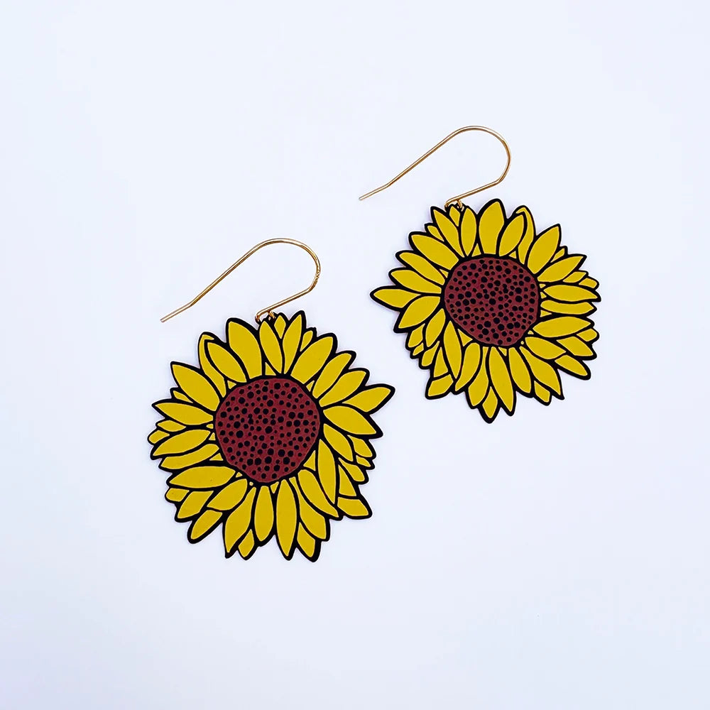 A pair of DENZ Sunflower Earrings in Brown & Yellow, and gold-tone hooks on a plain white background.