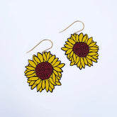 A pair of DENZ Sunflower Earrings in Brown & Yellow, and gold-tone hooks on a plain white background.