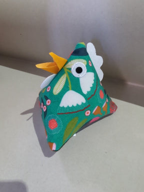 Thurlby Herb Farm Kitchen Pantry Poultry made from green botanical print fabric, featuring a yellow beak, white crest details, and an embroidered eye.