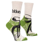 A pair of off-white and green Blue Q women's crew socks featuring a bicycle rider's perspective illustration and lower-case black text reading "bike."