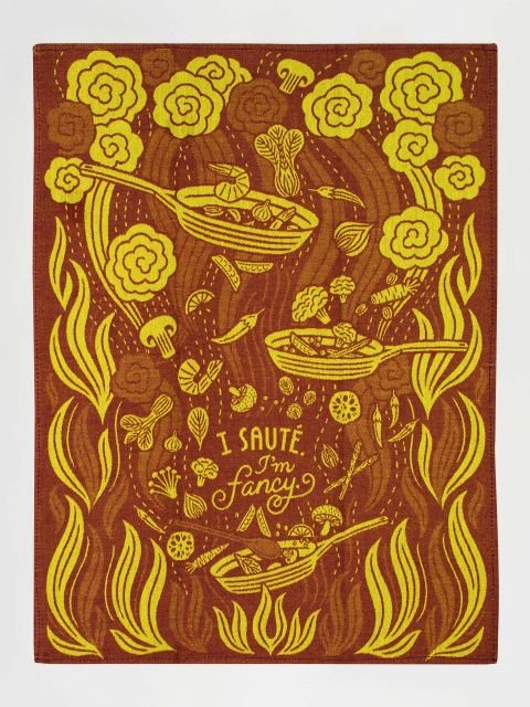 Blue Q I Saute Im Fancy Tea Towel Full View Rust Red Kitchen Towel.