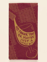 Blue Q woven maroon and gold tea towel depicting wine pouring into a glass with text reading "NO THANK YOU OK MAYBE JUST A LITTLE BIT."