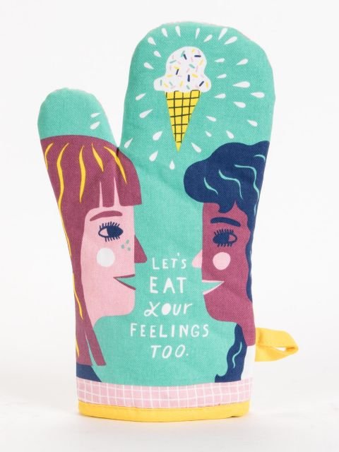 A teal Blue Q oven mitt featuring two women looking at each other beneath an ice cream cone illustration with white text reading "LET'S EAT YOUR FEELINGS TOO."