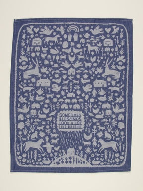 Blue Q Sometimes Blessings Look A Lot Like Bullshit Tea Towel Full View Blue Folk Art Dish Towel.