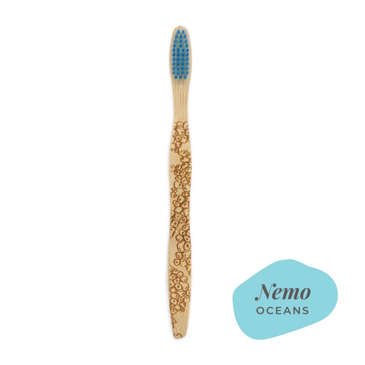 Brush It On Nemo adult bamboo toothbrush featuring ocean-inspired coral handle engravings and blue bristles